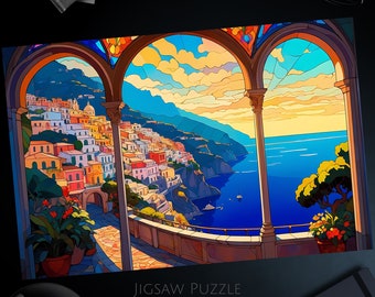 May include: A colorful jigsaw puzzle depicting a scenic view of a town built on a cliffside overlooking a blue ocean. The town is framed by two arched windows with a bright sky and clouds in the background. The puzzle is labeled "Jigsaw Puzzle" and "Made in USA".