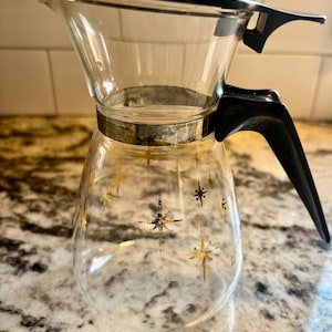 Vintage Pyrex-kaffekanna med atomärt stjärnmönster
