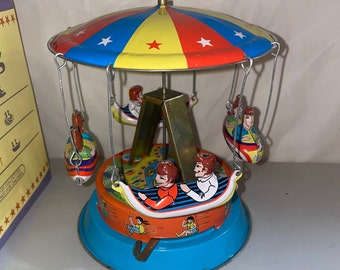 Merry Go-Round Series Turning Boat Tin Litho Toy