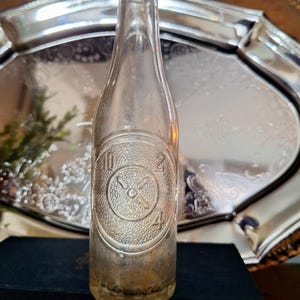 Vintage Dr. Pepper Bottle: Debossed Clock Design, 6 1/2 oz Clear Glass