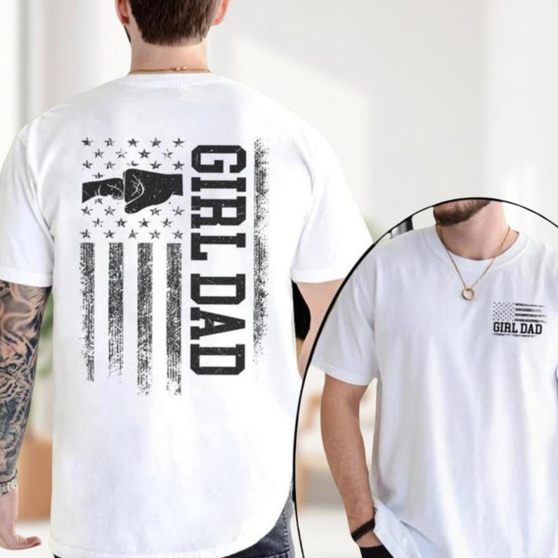 a man wearing a white shirt with a gun on it