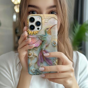 Funda vintage con diseño de colibrí, ideal para iPhone 12, 13, 14, 15 y 16, con estética floral natural.