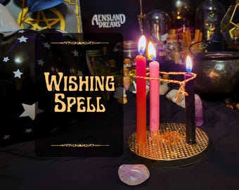 May include: A still life featuring a wishing spell setup with lit candles in red, pink, and purple. The candles are on a gold-colored base, with a pink crystal and the text "Wishing Spell" in the background. The background includes jars and bottles.