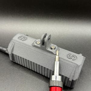 A rugged, 3D-printed case for the LilyGO TBeam Supreme, featuring an integrated GoPro mount. Perfect for Meshtastic enthusiasts