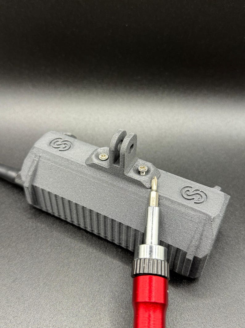 A rugged, 3D-printed case for the LilyGO TBeam Supreme, featuring an integrated GoPro mount. Perfect for Meshtastic enthusiasts