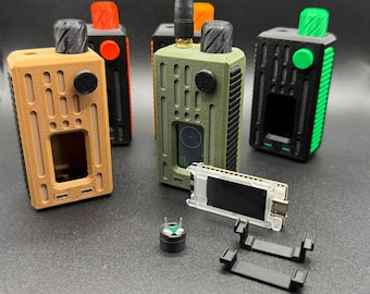 May include: A set of five radio transceivers in different colors, including black, green, orange, and tan. The transceivers have antennas and are arranged in a row on a black surface. There is also a small black circuit board with a screen, two black plastic clips, and a small black component with green wires.