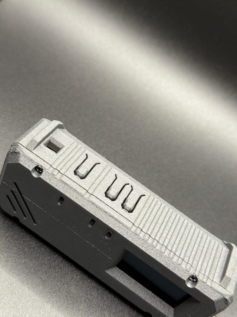 A rugged, 3D-printed case for the LilyGO TBeam Supreme, featuring an integrated GoPro mount. Perfect for Meshtastic enthusiasts