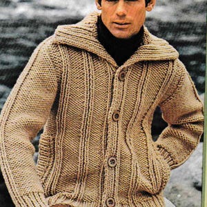 May include: A tan knitted cardigan with a collar, button closure, and pockets. The cardigan is made of a soft, textured yarn.