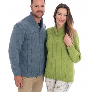 May include: A couple wearing matching knit sweaters. The man is wearing a blue sweater with a shawl collar, and the woman is wearing a green sweater with a similar collar. Both sweaters have a textured knit design.
