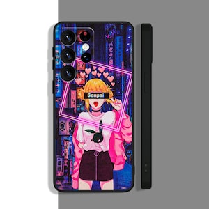 May include: A black phone case with a colorful anime character design. The character is a young woman with blonde hair and pink clothing. The background is a neon cityscape with Japanese text. The text "Senpai" is written in pink across the character's face.
