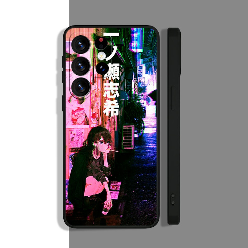 May include: A black phone case with a colorful anime-style image of a girl in a dark alley. The case has a glitch effect and the text "ノ 趣味 芸術" in Japanese.