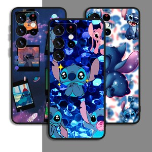 May include: Three phone cases with different designs featuring Stitch from Lilo & Stitch. The first case has a galaxy design with Stitch and other characters. The second case has a blue glitter design with Stitch and other characters. The third case has a white background with Stitch and other characters.