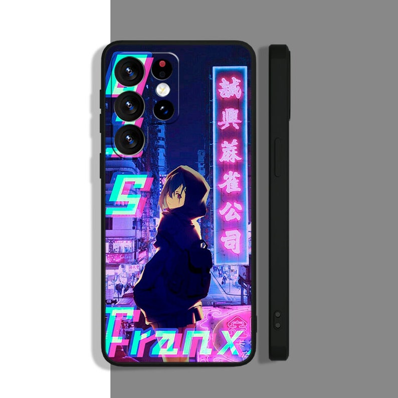 May include: A black phone case with a neon pink and blue anime character standing in front of a city skyline. The case has a neon pink and blue design with the text "FranX" on the bottom. The case also has a neon pink and blue sign with Japanese characters on the right side.
