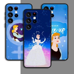 May include: Three phone cases featuring Cinderella. The first case is light blue with a Cinderella character and a blue bird. The second case is dark blue with a Cinderella character in a white dress and the text "Believe". The third case is light blue with a Cinderella character and the text "Never Give Up".