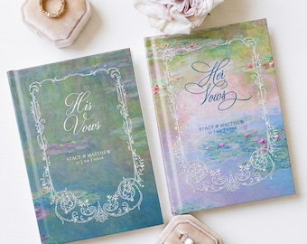 May include: Two hardcover vow books featuring a Monet-inspired water lily print. The left book reads His Vows, and the right book reads Her Vows, both with Stacy & Matthew 11 | 09 | 2026 printed below. Each book has a silver filigree frame design.