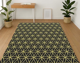 May include: Black and yellow geometric area rug with a repeating pattern of overlapping circles.