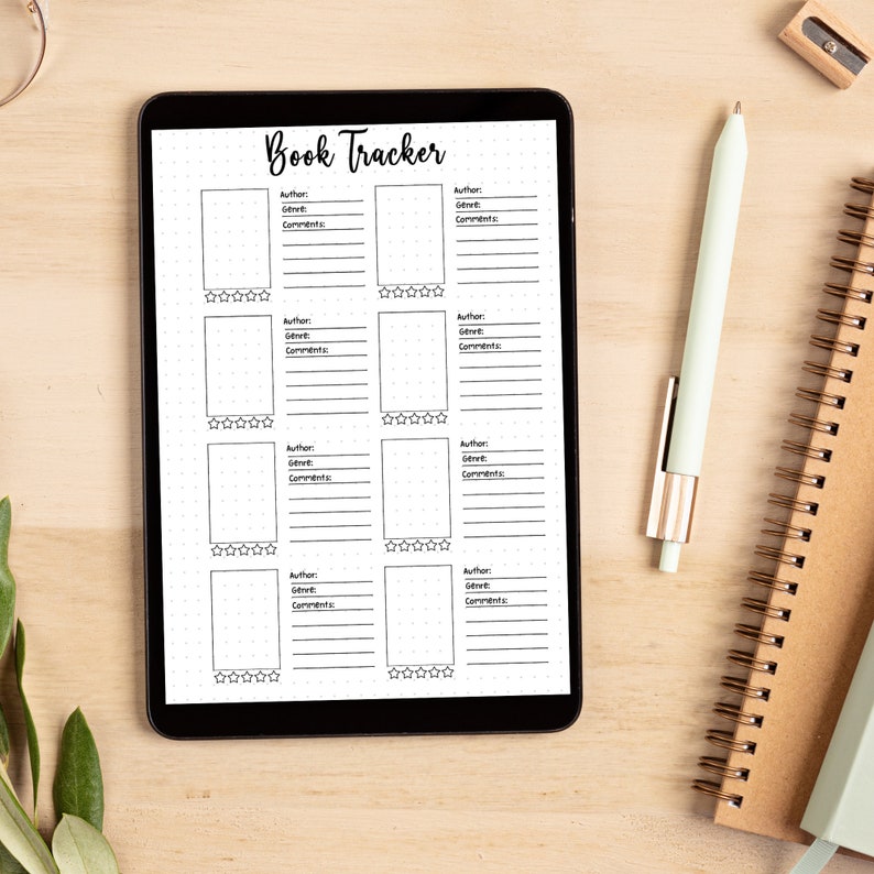 May include: A digital tablet screen displaying a black and white book tracker with sections for author, genre, and comments. The tracker has a rating system with five stars.