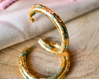 Olive green polymer clay hoops with golden flakes