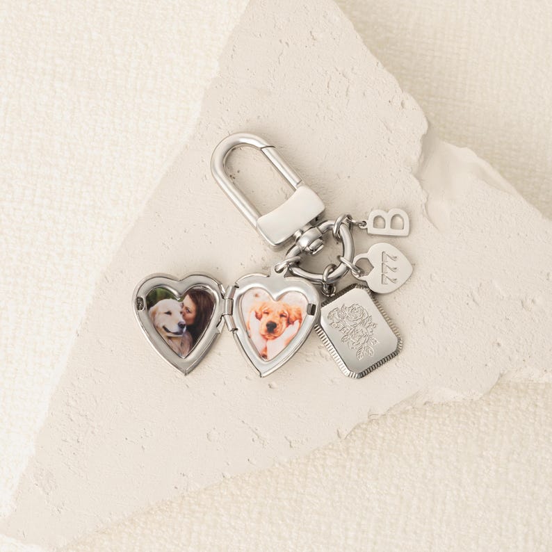 a couple of key chains with pictures on them
