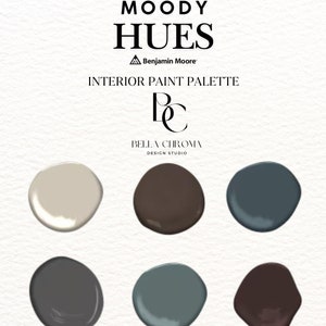 May include: An interior paint palette titled "Moody Hues" by Benjamin Moore, featuring nine paint color swatches in a variety of muted tones. The image includes the Bella Chroma Design Studio logo and text about downloadable color palettes.