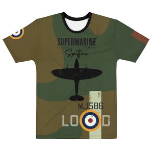 A WWII-era RAF Supermarine Spitfire Fighter Plane Soars Through A Pale Sky Propeller Spinning At Duxford England Image671985228