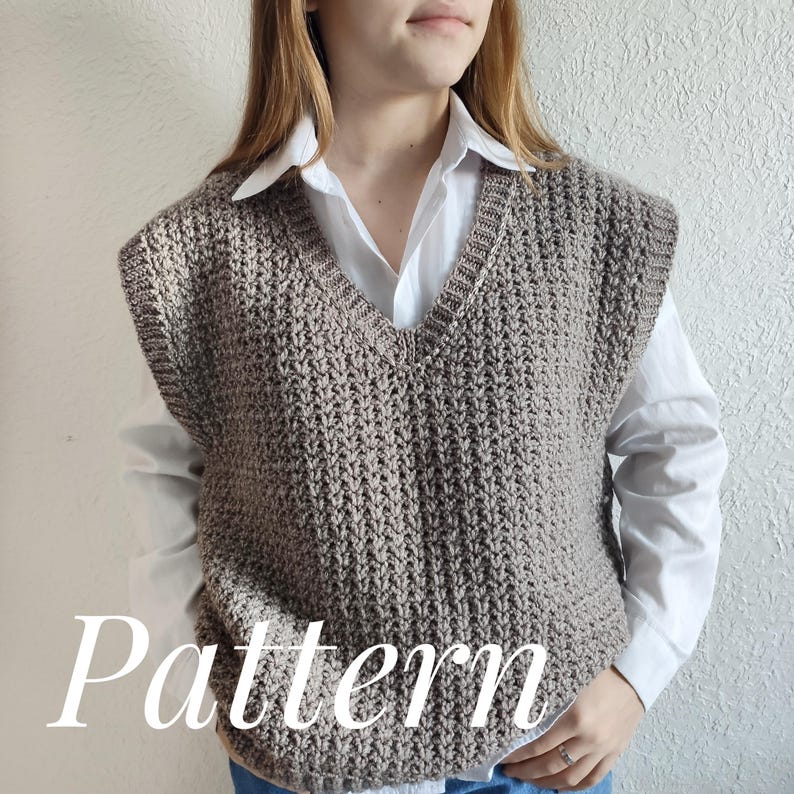 May include: A tan, V-neck crochet vest with a textured stitch pattern. The vest is worn over a white collared shirt. The word "Pattern" is displayed in white script across the bottom of the vest.