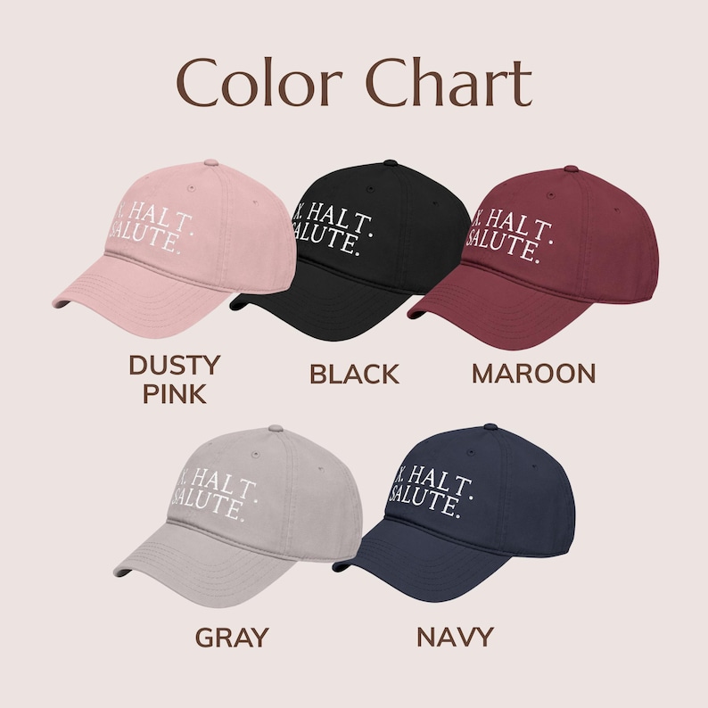 May include: A color chart displays five baseball caps in various colors: dusty pink, black, maroon, gray, and navy. Each cap features the text "HALT. SALUTE." in white. The image is set against a neutral background.