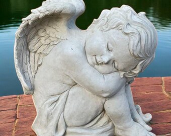 Hugging knee cherub figure Concrete religious decoration Garden angel memorial gift Outdoor or indoor statuary Yard art Made in USA