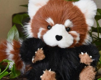 手作りのレッサーパンダの重みのあるぬいぐるみ：コレクターの必需品