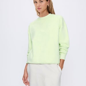 Women’s sweatshirt sewing pattern, pullover pattern for women, crew neck sewing pattern, fleece top pattern, hoodie sewing pattern, long sleeve top sewing pattern, loungewear sewing pattern for women, printable sweatshirt pattern PDF, beginner-friendly sewing pattern, digital women’s clothing pattern, comfy everyday pullover sewing project for stretch fabrics, jumper pattern for women, oversized sweatshirt pattern for women