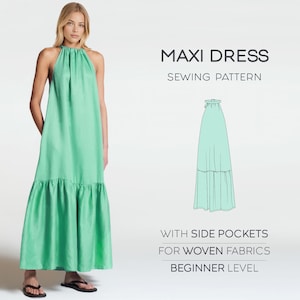 Puede incluir: Un vestido largo verde menta con cuello halter y dobladillo con volantes. El vestido tiene bolsillos laterales y está diseñado para tejidos. El texto de la imagen dice "MAXI DRESS SEWING PATTERN" y "BEGINNER LEVEL".