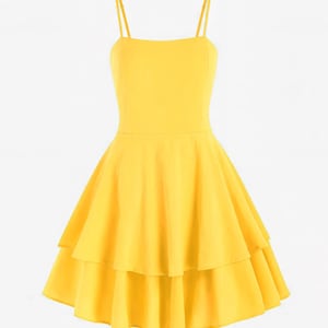 May include: A bright yellow dress with thin spaghetti straps and a tiered skirt. The dress has a fitted bodice and a flared, layered skirt. The fabric appears to be smooth and lightweight, suitable for warm weather.