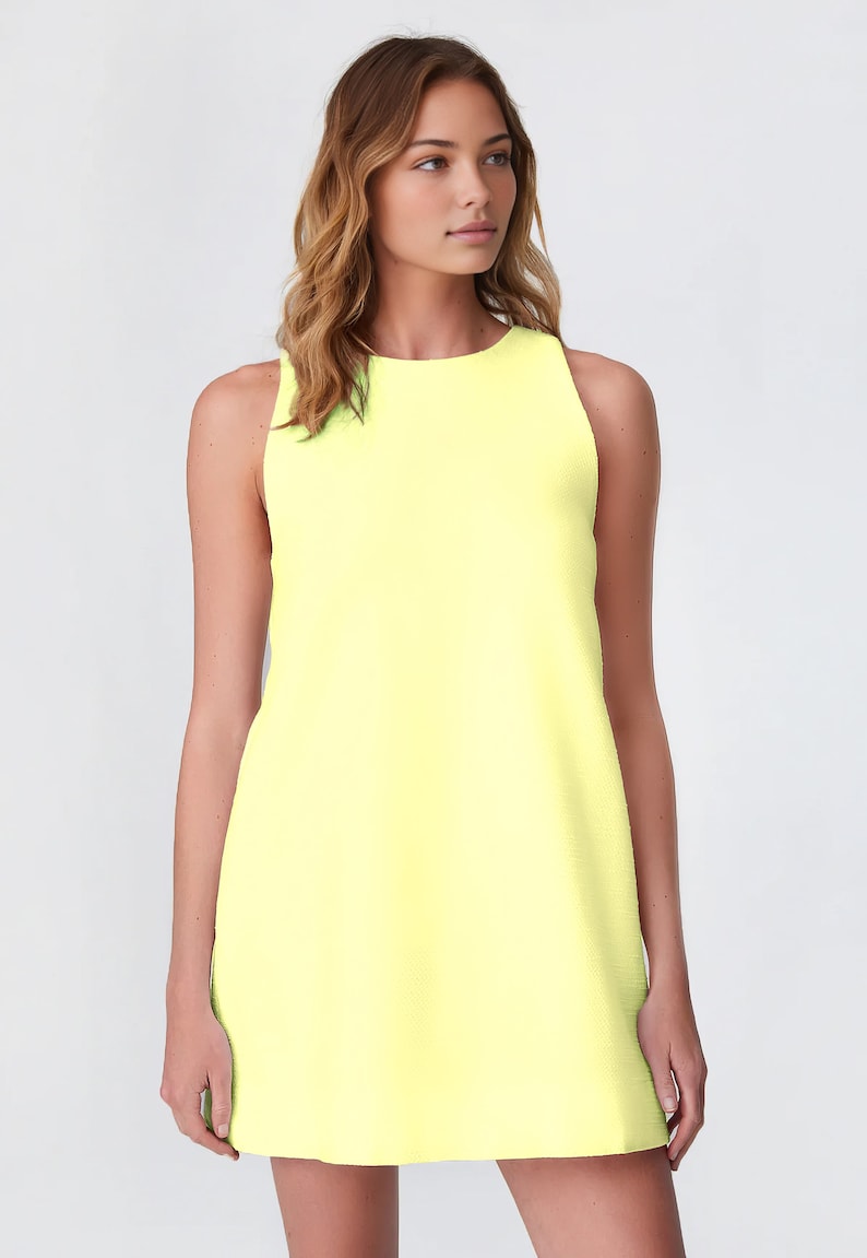 May include: A sleeveless, bright yellow mini dress with a round neckline.