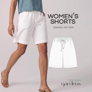 May include: White shorts with an elastic waistband and a drawstring tie. The image includes a technical line drawing of the shorts and the text WOMEN'S SHORTS SEWING PATTERN and the brand name Pattern gardens.