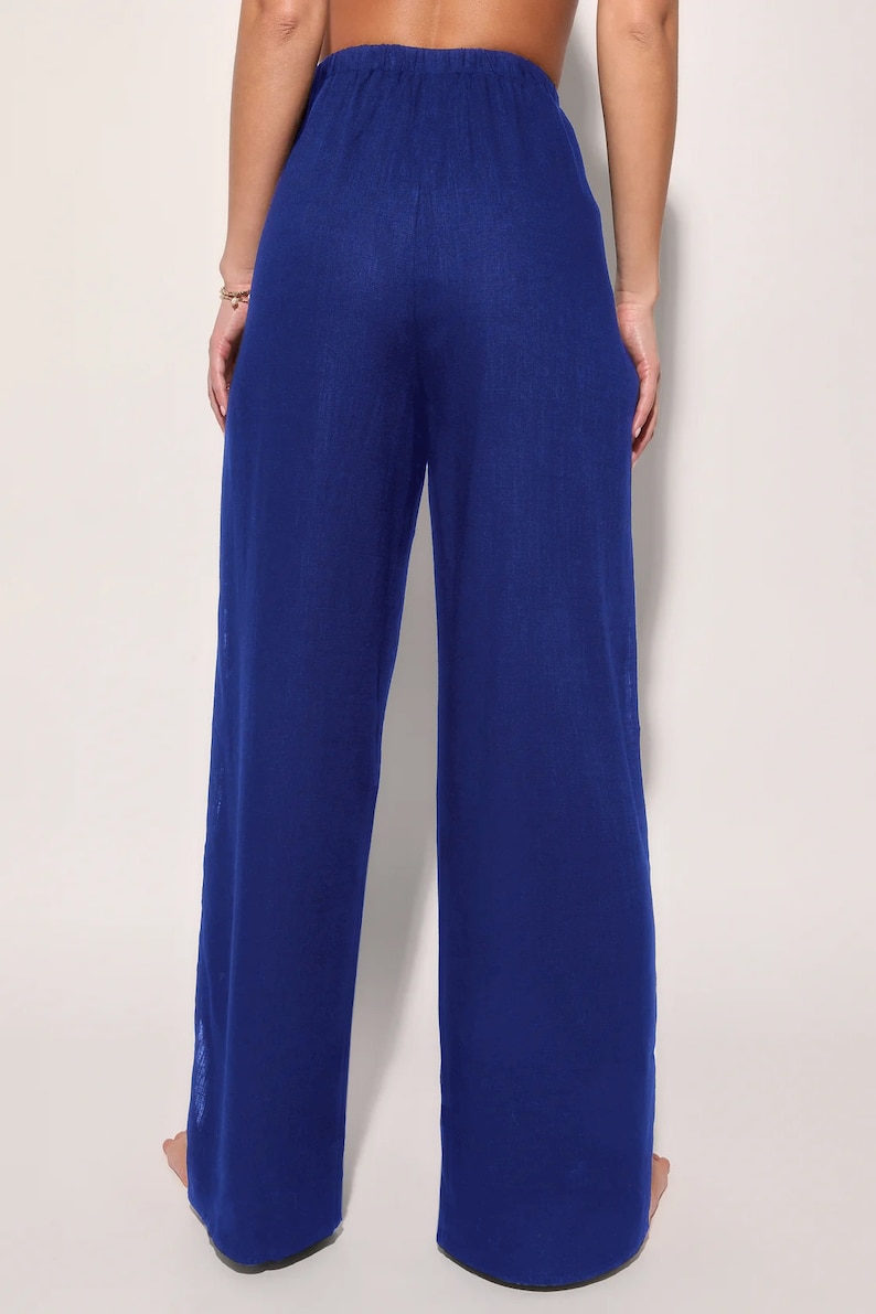 May include: Royal blue wide-leg pants with a drawstring waist.
