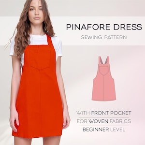 May include: A sewing pattern for a pinafore dress with a front pocket. The pattern is for woven fabrics and is beginner level. The image shows a woman wearing a red pinafore dress.