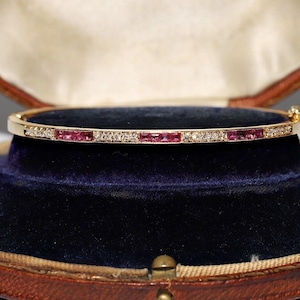 Vintage Circa 1980s 18k Gold Natural Diamond And Caliber Cut Ruby Bracelet