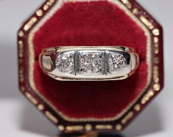 Anel de três pedras decorado com diamantes naturais em ouro 18k, antigo, por volta de 1900