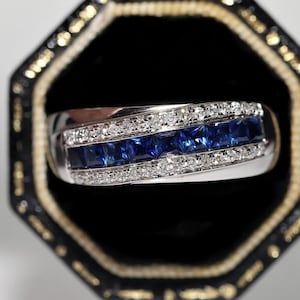 18k Gold Natural Diamond And Caliber Sapphire Decorated Band Ring