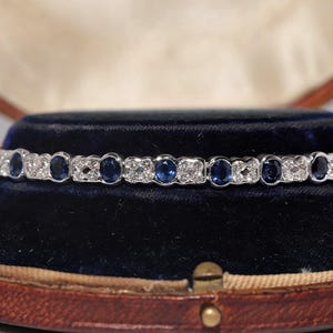 Vintage Circa 1980s 18k Gold Natural Diamond And Oval Cut Sapphire Bracelet