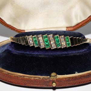 Vintage Circa 1980s 18k Gold Natural Diamond And Emerald Bangle Bracelet