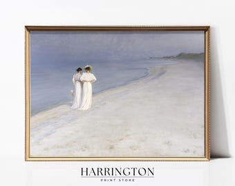 May include: Two women in white dresses walk along a sandy beach with the sea in the background. The sky is a light blue and the water is a light blue-green.
