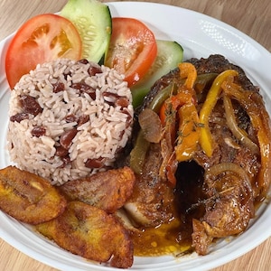 May include: A set of three ceramic mugs with a speckled, matte finish in cream, light grey, and dark grey. Each mug has a simple, minimalist design, ideal for coffee or tea.