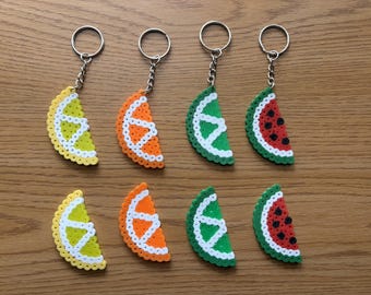 Handmade Perler fruit slice keychains and magnets