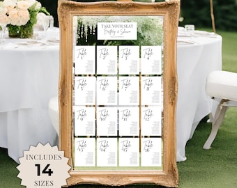May include: A gold-framed mirror with a white seating chart for a wedding. The chart is divided into 16 sections, each labeled with a table number from 1 to 16. The text "Take Your Seat" is at the top of the chart, followed by the names "Brittany & Shawn".
