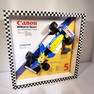 Formula One F1 Williams FW14 - Nigel Mansell - 1992 - Car made of LEGO® compatible bricks in a wooden frame - Wall decoration.