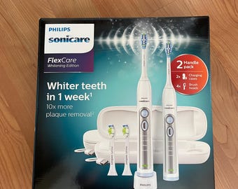 SEALED! Philips Sonicare FlexCare Whitening Edition Toothbrush Set – 2 Handles, 4 Brush Heads, 2 Charging Cases. VTG set sold out long ago!