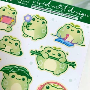 Each sticker is individually die-cut with a smooth white border, ready to peel and stick. The sheet is sized at 4×6 inches, making it perfect for planners, journals, scrapbooks, pen pal letters, laptop decoration, water bottles, and cozy desk setups. The overall mood of the image is gentle, calming, playful, and comforting—ideal for frog lovers, stationery collectors, and anyone who enjoys cute character art.