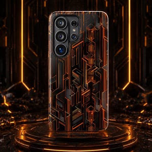 May include: Black and orange geometric design phone case. The case features a complex pattern of lines and shapes in black and orange. The phone case is on a black pedestal with orange lighting.