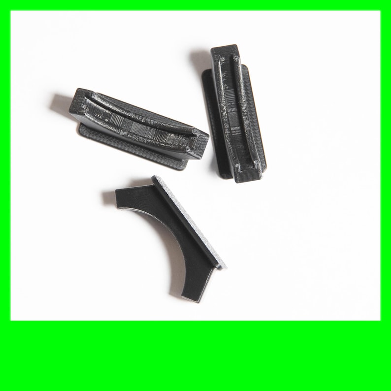 3 sobriety token display stands, 2 vertical and one on its side on a white background
